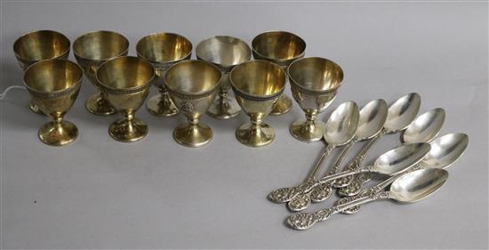 Ten mid 19th century French silver egg cups, Henri-Louis Chenailler, surmounted with the Marquis de Bellrohce crest
